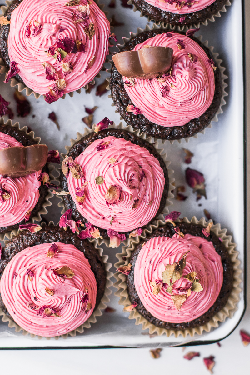 Chocolate strawberry cupcakes with rose petals and chocolate