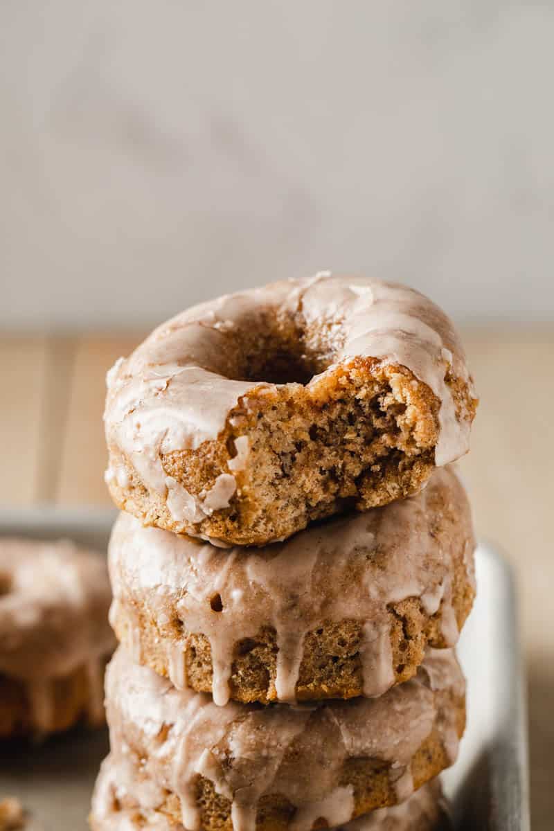 Healthy baked snickerdoodle donut recipe made gluten free and vegan with a sweet cinnamon glaze.