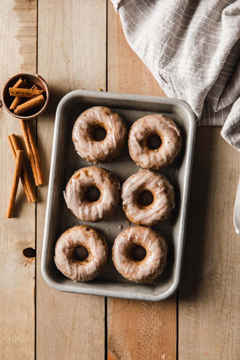 Healthy baked snickerdoodle donut recipe made gluten free and vegan with a sweet cinnamon glaze.