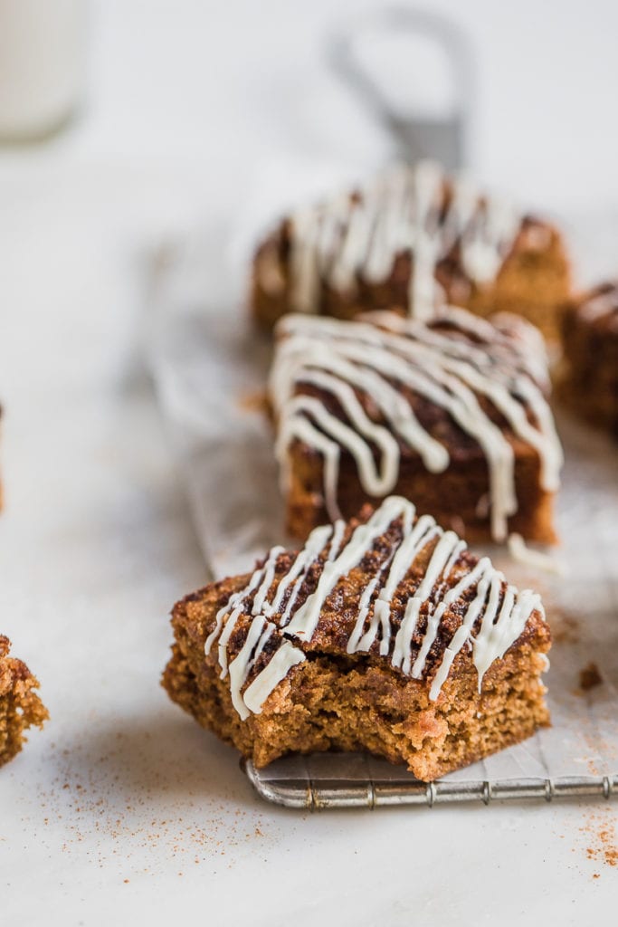healthy snickerdoodle bars with a bite taken out