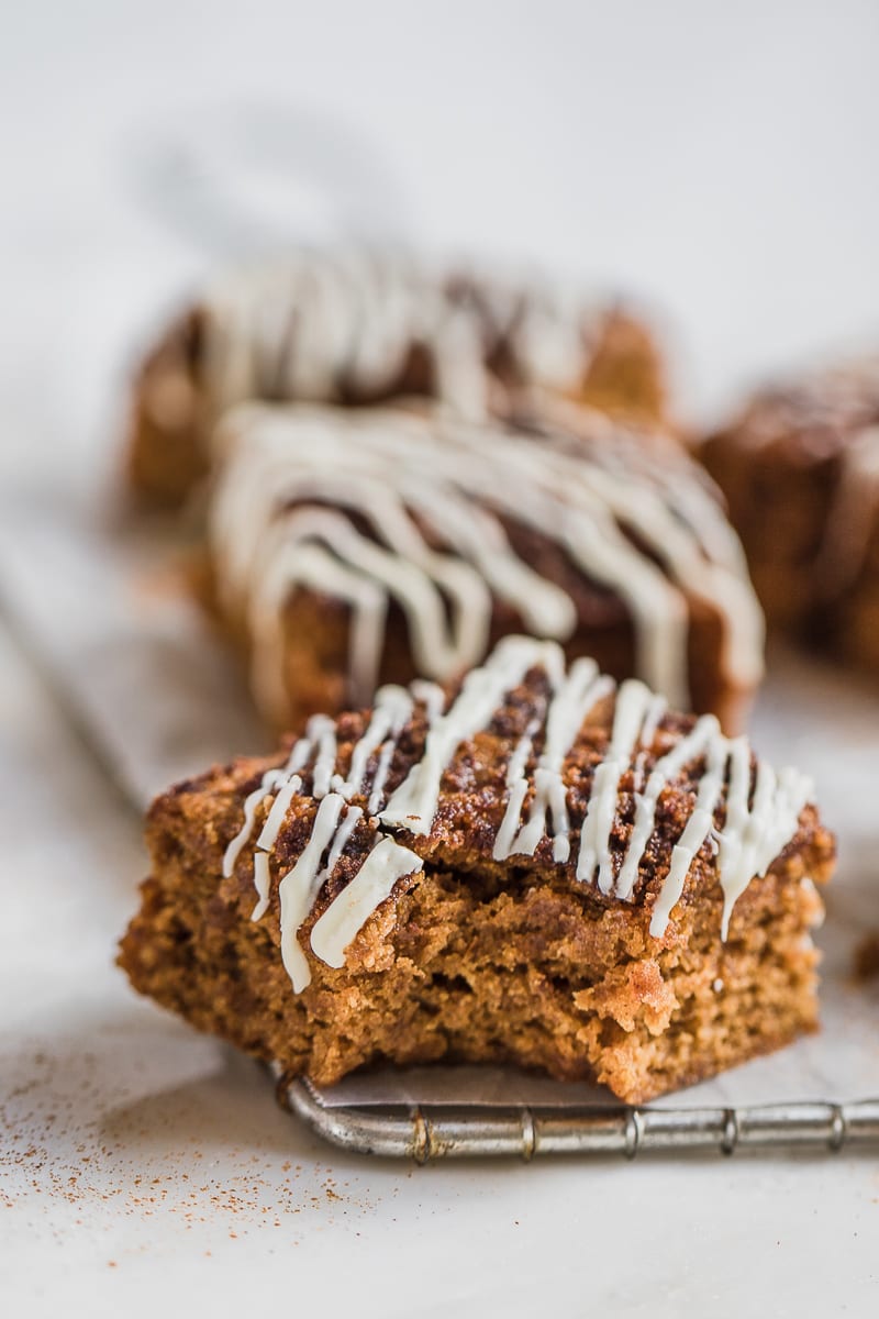 Thick and chewy pumpkin snickerdoodle bars with a bite taken out