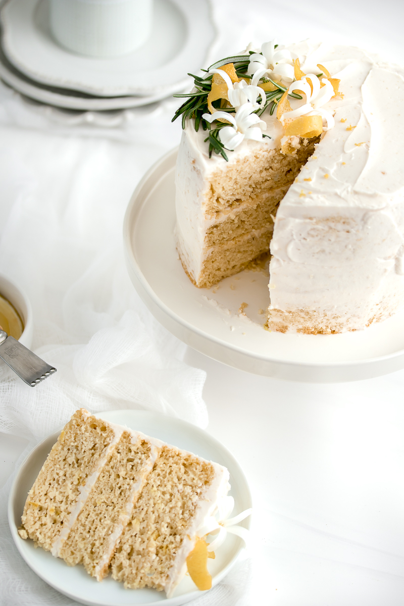 Lemon olive oil cake on a white background.