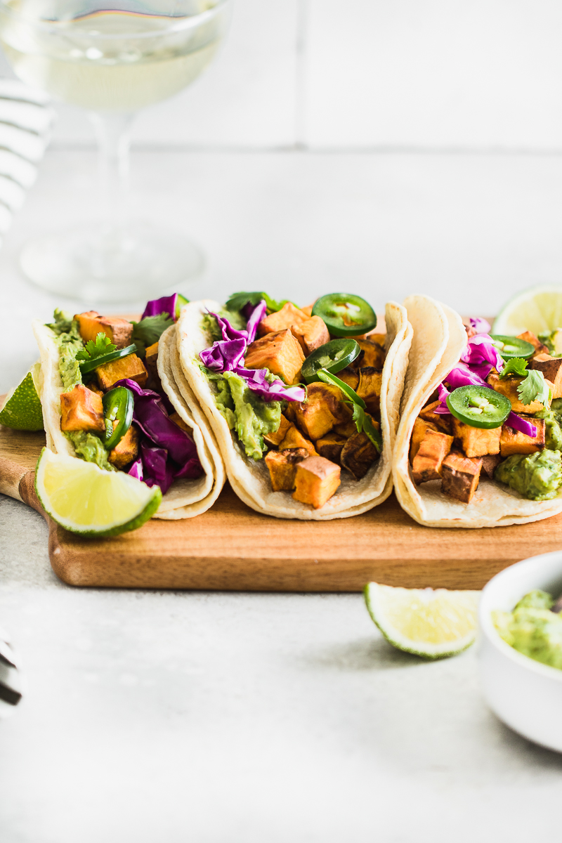 Sweet Potato Vegan Tacos with a glass of wine.