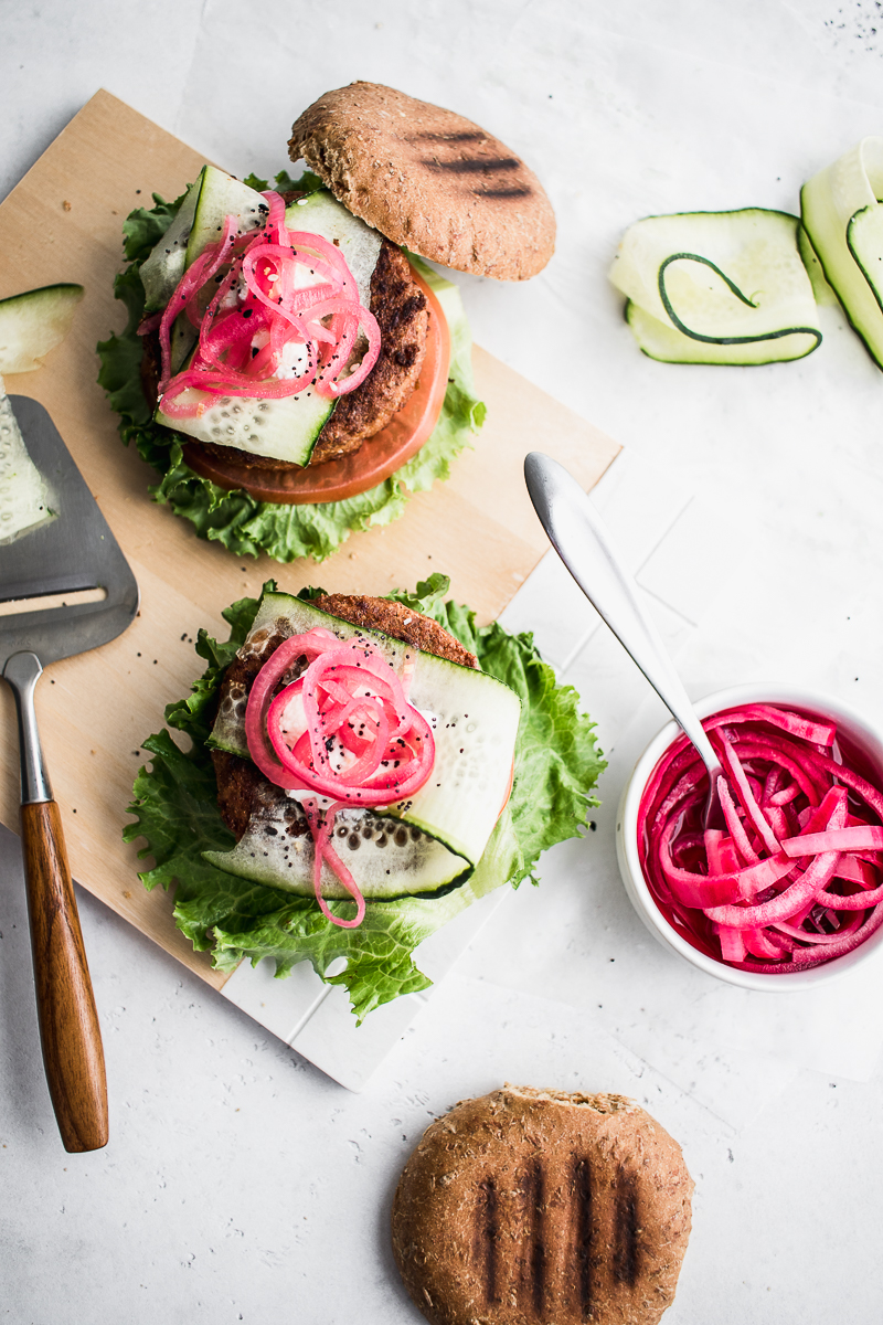 Plant based burgers flat lay with pickled red onion