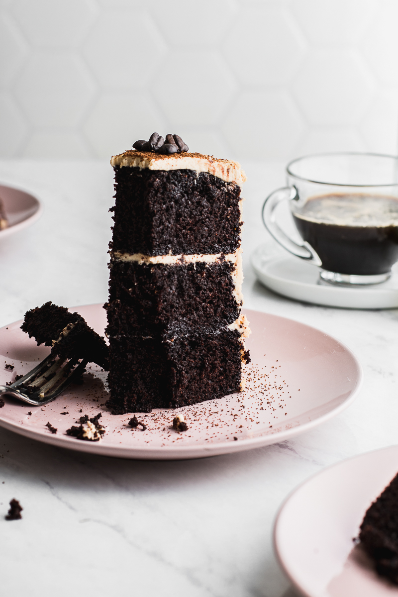 chocolate cake with espresso on marble backdrop