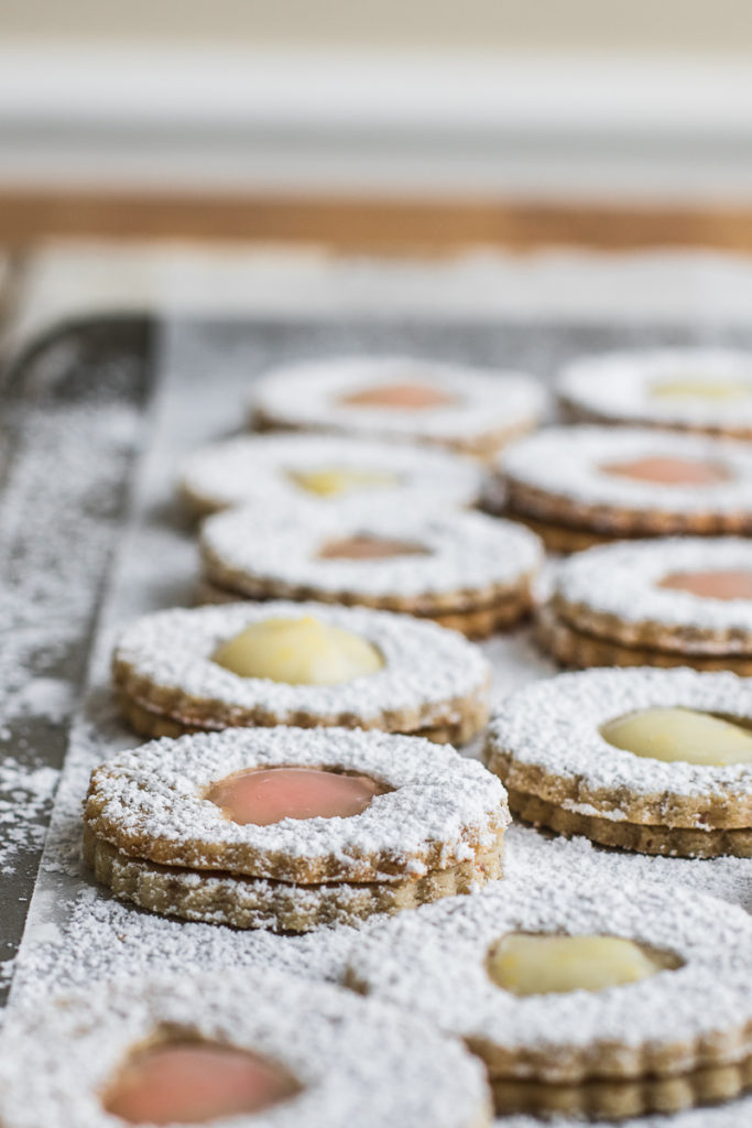 linzer cookies dusted with powdered sugar