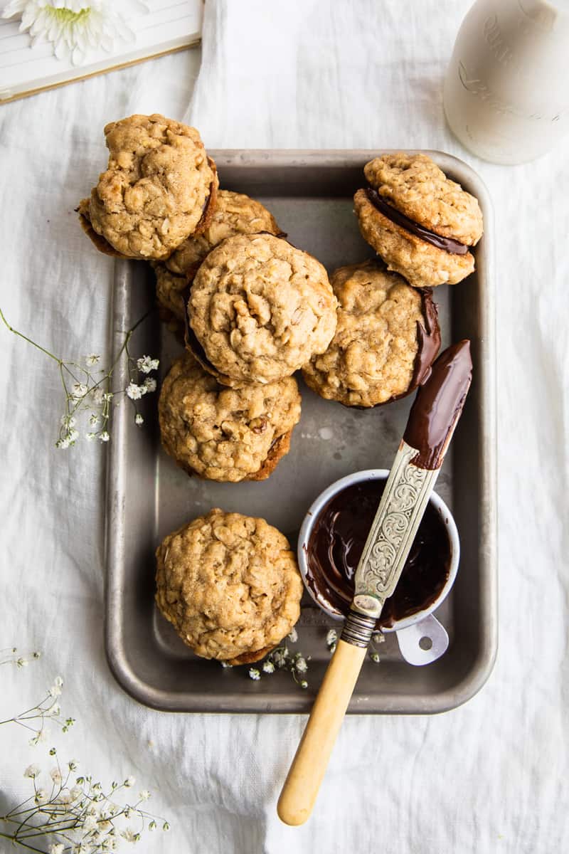 vegan oatmeal cookies sandwiched with chocolate 