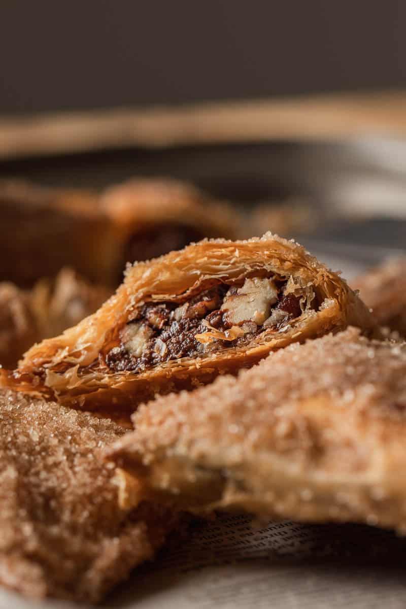 One of my favorite phyllo dough recipes. Easy filo recipe filled with chocolate pecan and coated in cinnamon sugar.