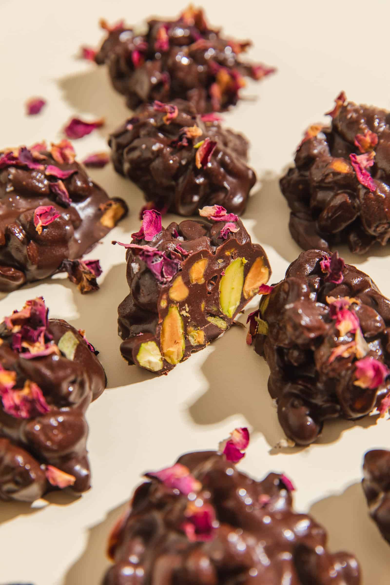 Chocolate pistachio clusters keto snack with rose petals