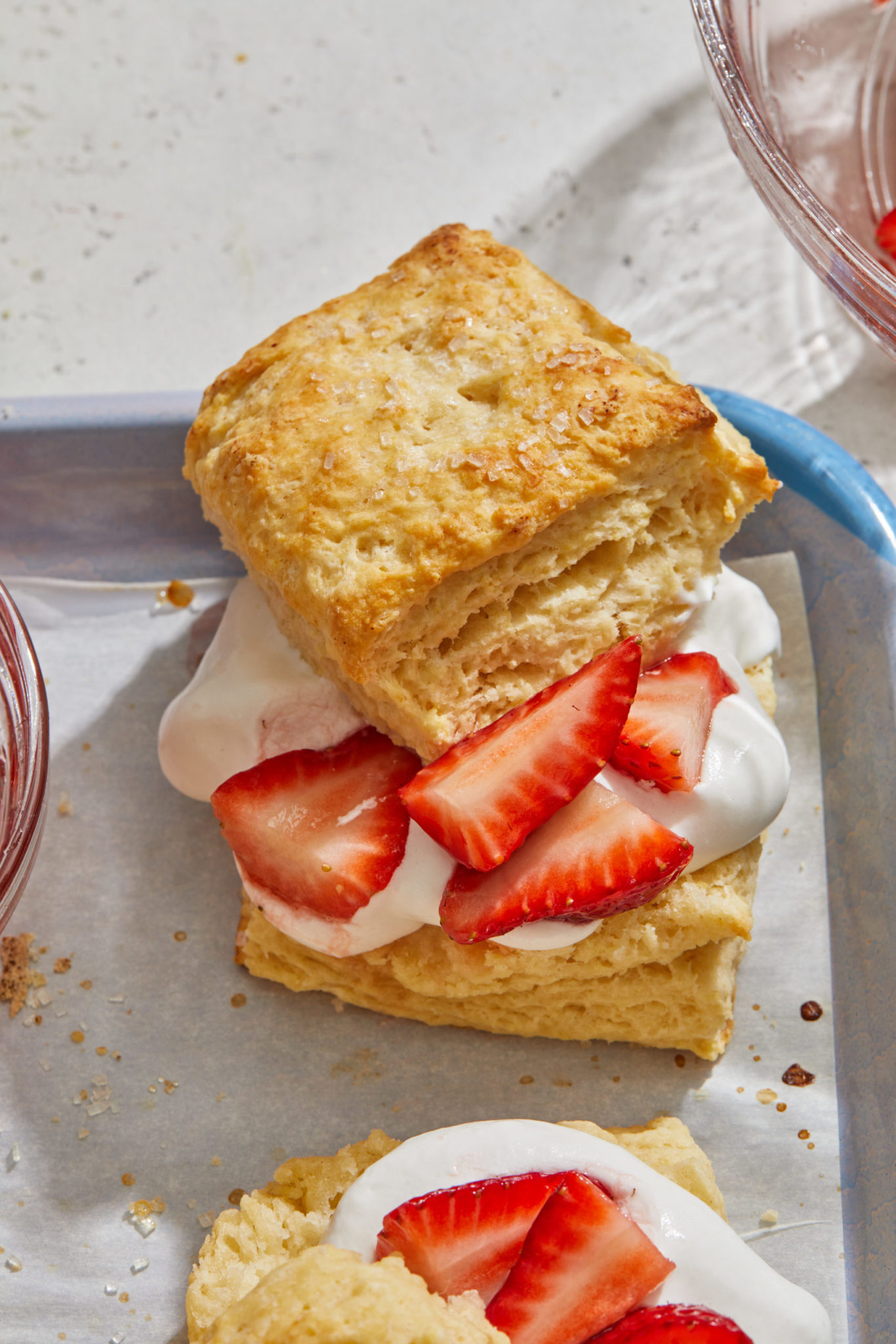 Vegan strawberry shortcake biscuits with strawberries and coconut whipped cream